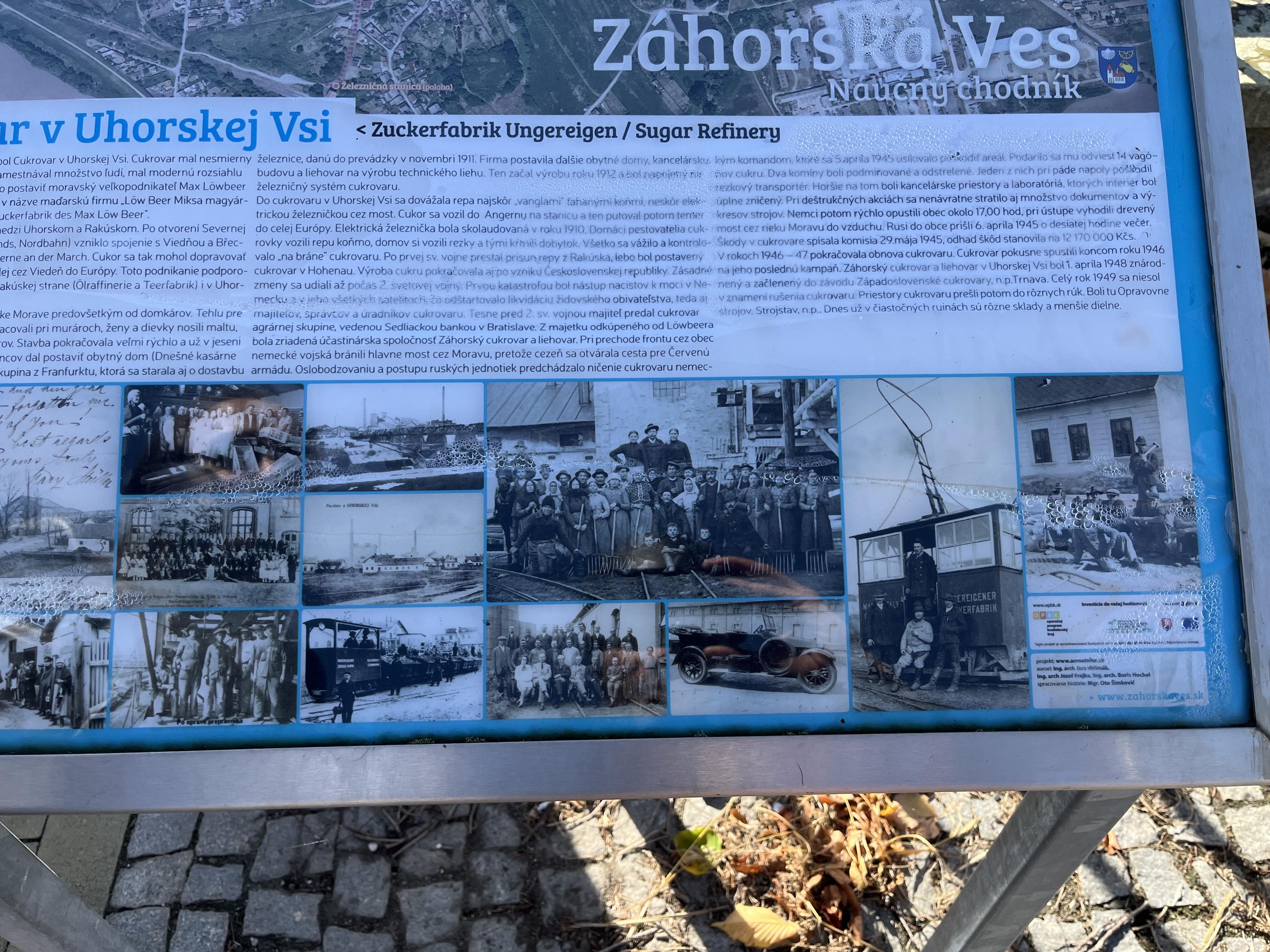 Plaque with pics of the old railway at the bottom