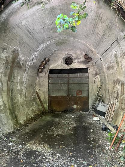 Entrance to a closed up tunnel 